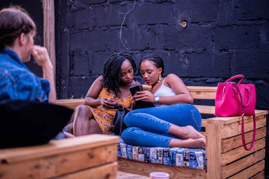 woman wearing yellow sleeveless dress